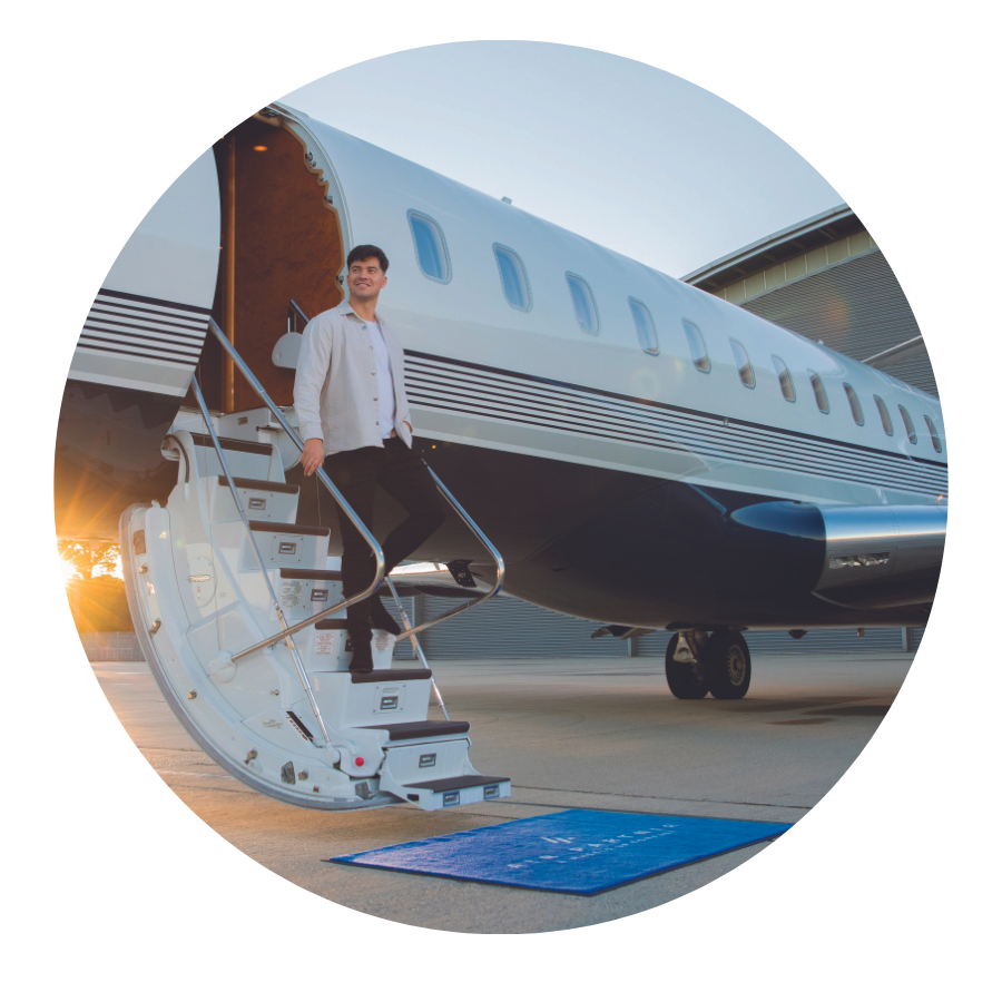 Man arriving on private jet Air Partner