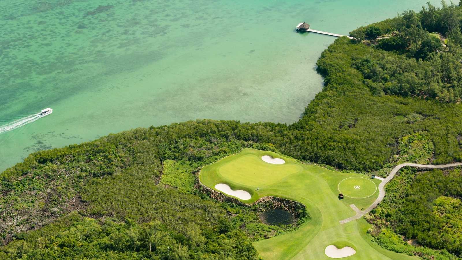 Aerial view of golf course and lagoon in Mauritius