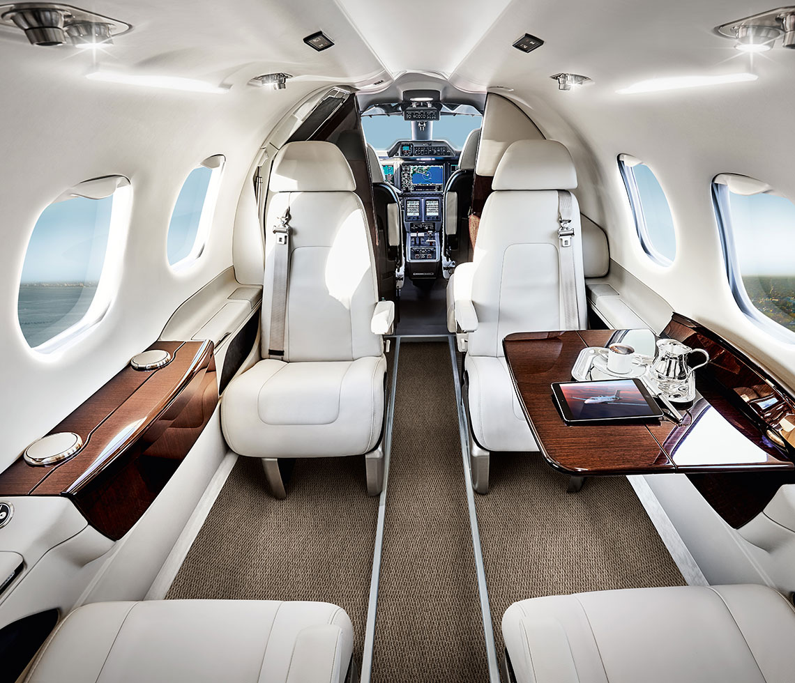 Embraer Phenom 100 interior of small private jet cabin