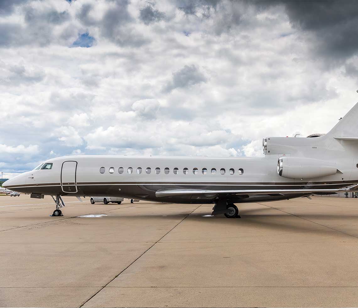 Dassault Falcon 8X private jet charter at airport hangar