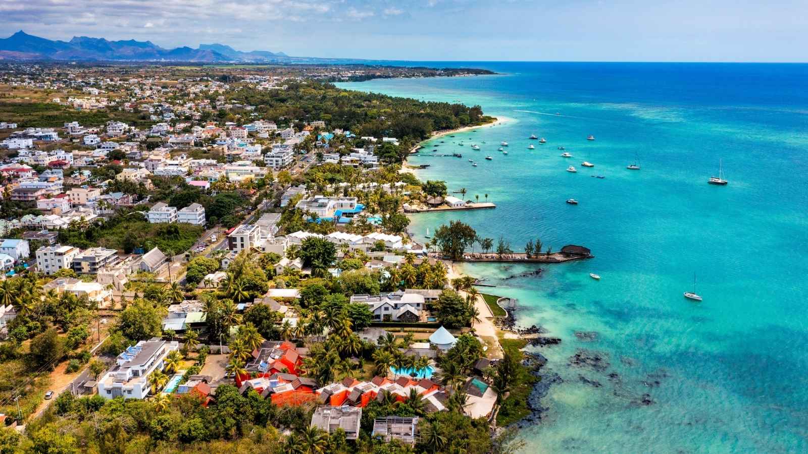 Mauritius beach aerial view of Mont Choisy beach in Grand Baie, Pereybere North