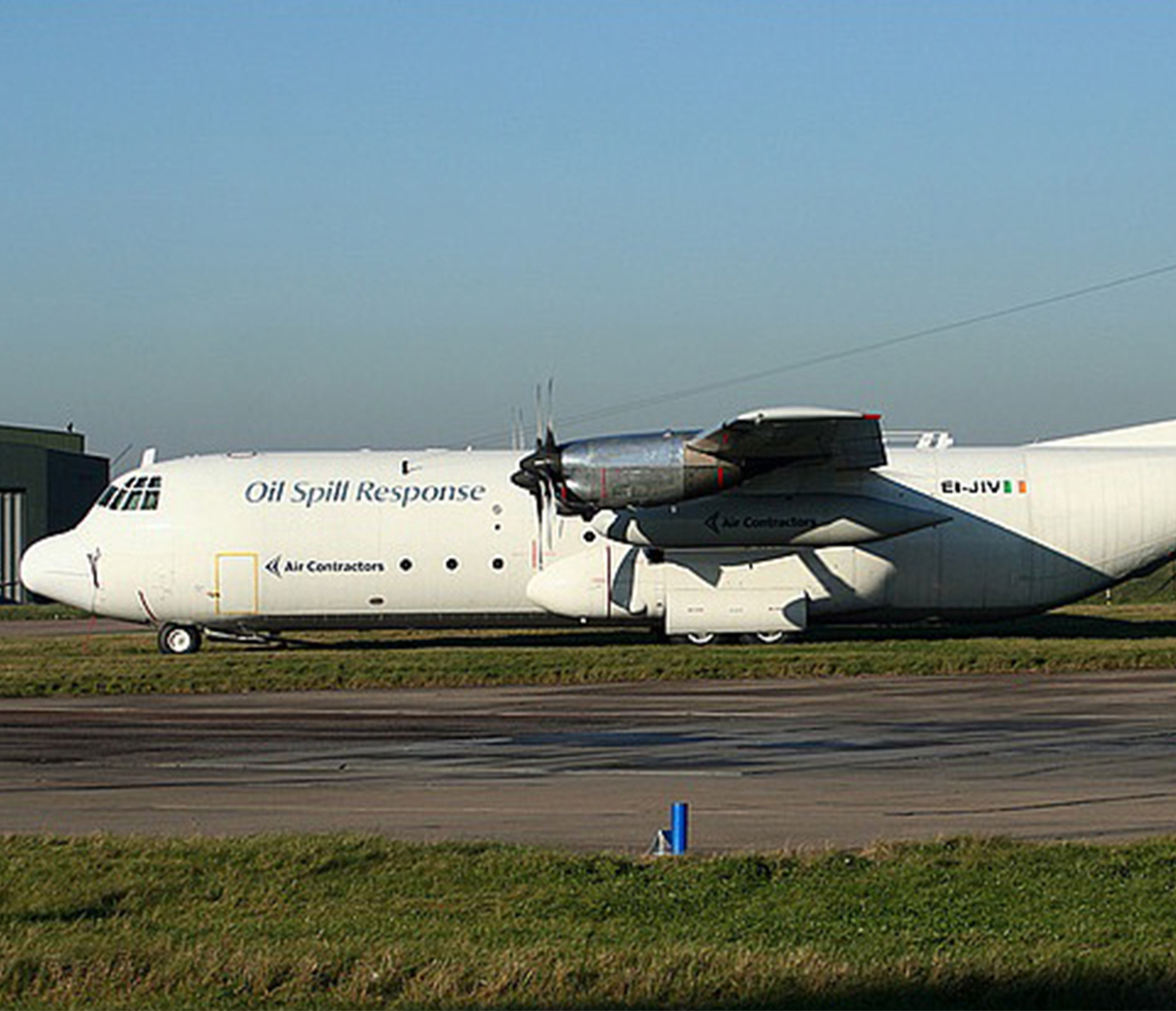 Lockheed L100-Hercules cargo charter aircraft on runway