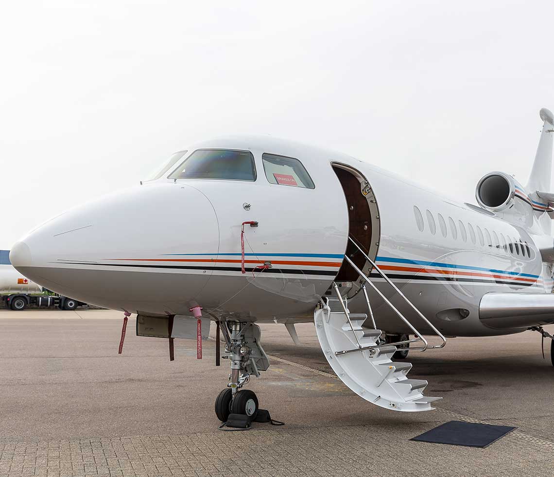Dassault Falcon 7X private jet charter with stairs open