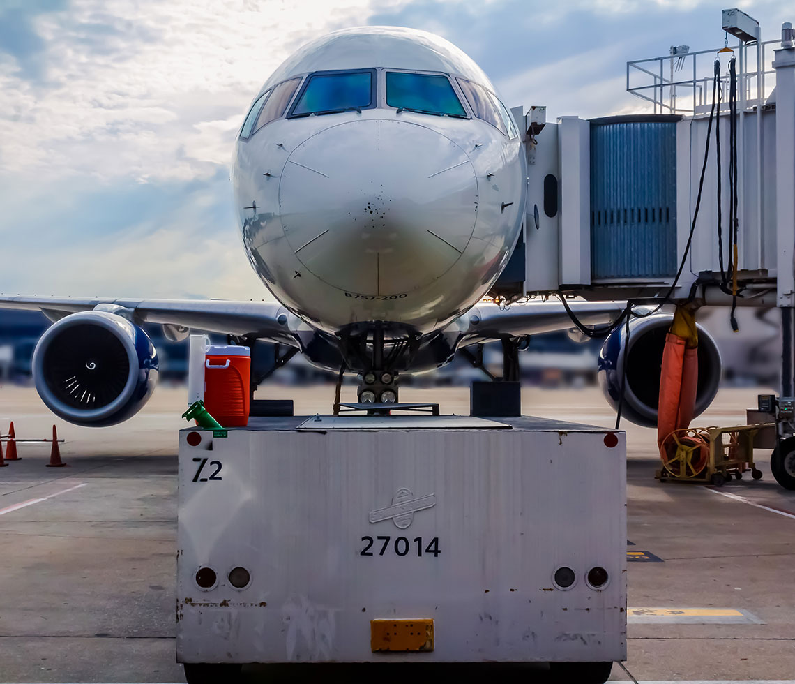 Boeing B757-200 private aircraft charter at airport terminal