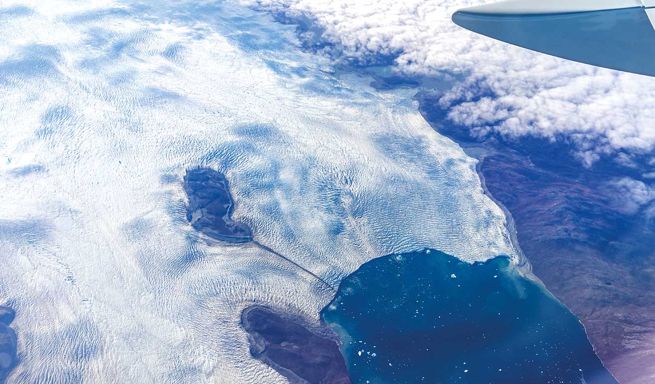 aerial shot from a plane over a lake